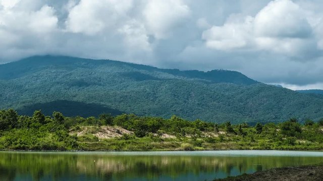 Beautiful cloud moving behind mountain and lake - Timelapse 4k