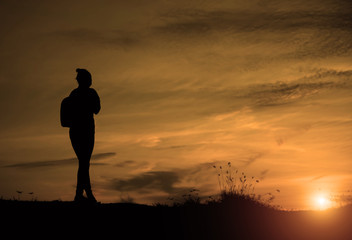 woman travelling in nature with backpack