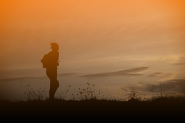 Fototapeta premium woman travelling in nature with backpack