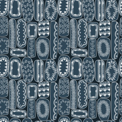 Seamless vector pattern with hand drawn decorated stones