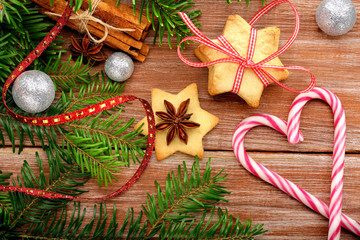 Christmas cookies with decoration on wooden background