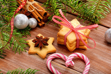 Christmas cookies with decoration on wooden background