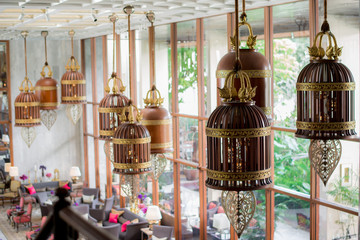 Obraz premium Giant wooden bell hanging on the ceiling.