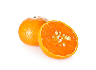 whole and half cut orange on white background