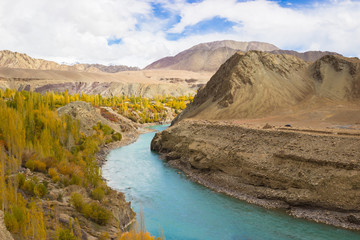 Himalayan landscape in Himalayas Mountain with river and blue sky , Leh Ladakh