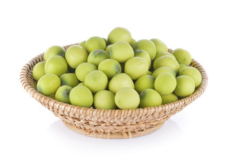 lotus seeds in basket on white background