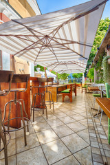 sunshade on terrace in street cafe