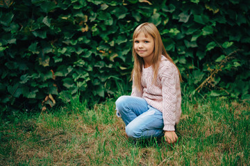 beautiful young girl posing on the street