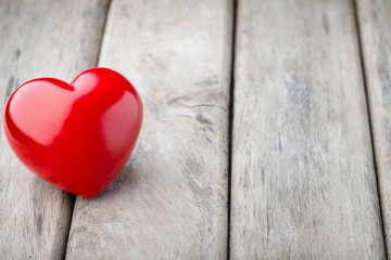 Fototapeta premium Red heart on the gray metal background.