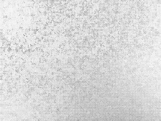 Fototapeta premium Halftone dots vector texture overlay. Black and white color abstract subtle grainy background.