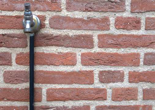 outside water tap. The handle has been removed in order to prevent random and vandal use by others.