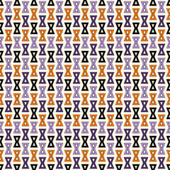 Seamless pattern in Halloween traditional colors. Bright ornamental abstract background.