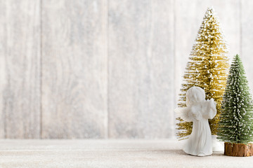 Christmas fir branch and decor, on the wooden background.