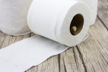 Tissues paper isolated on wood background