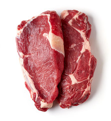 Fresh raw beef steak isolated on white, from above