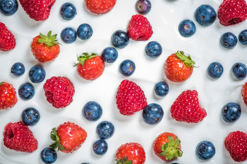 Fototapeta na wymiar Fresh berries on yogurt