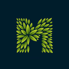 Fototapeta na wymiar M letter logo formed by fresh green leaves.