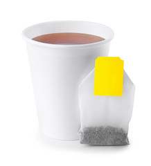 paper cup with tea and tea bag isolated on white © alter_photo