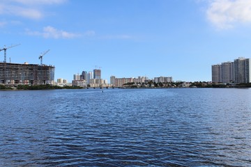 Fototapeta premium Sunny Isles Beach Skyline from the Waters Edge on a Clear Day