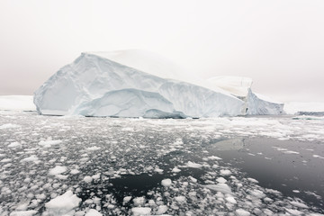 Fototapeta na wymiar Icebergs are on the arctic ocean, Ilullisat, Greenland. May 16, 2016.