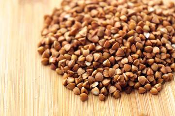 Scattered view of dry raw peeled buckwheat