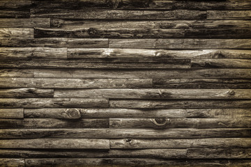 Wall of the rural house made from teak wooden logs. Seamless texture