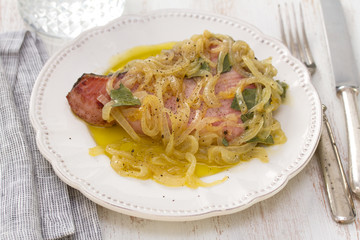 fried tunawith onion on dish