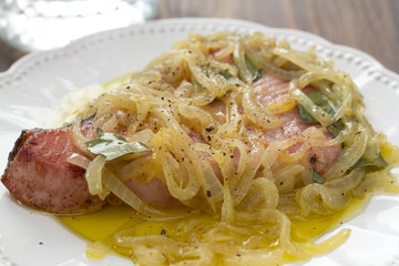 fried tunawith onion on dish