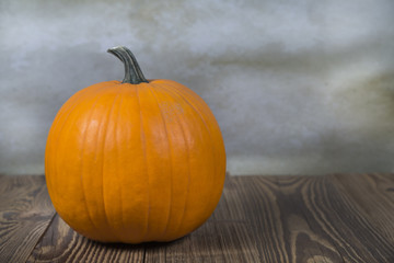 Orange Pumpkins with leaf as a symbol of Autumn and Halloween