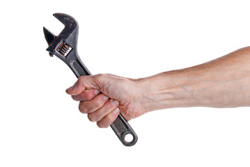 Big wrench in hand on an isolated background