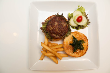 burger And Fries with vegetables