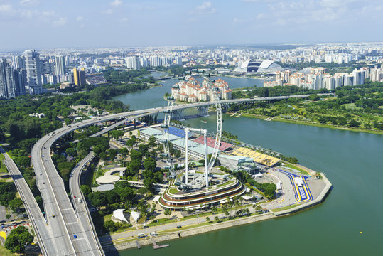 High view over Singapore with the Singapore Flyer ferris wheel and ECP expressway, Singapore