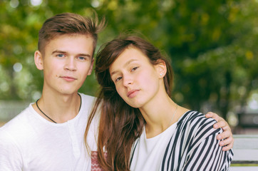 Fototapeta premium Romantic couple together in a park in autumn