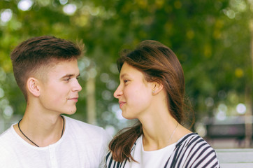 Fototapeta premium Romantic couple together in a park in autumn
