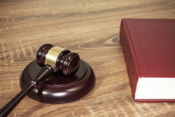 Judge gavel and old books