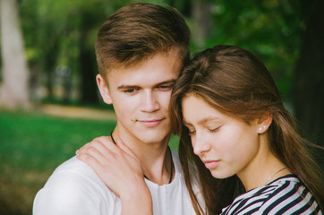 Romantic couple together in a park in autumn