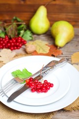 Autumn ripe juicy pears on a wooden table