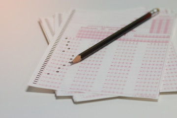 answer sheet, test score sheet with pencil on test paper answers