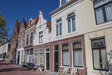 Fototapeta na wymiar Street with typical dutch houses in Alkmaar