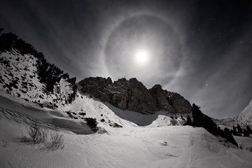 Full moon with halo in Small Almaty Gorge, Tian Shan mountains, Kazakhstan - 122749110