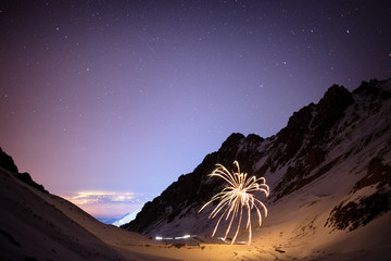 Fireworks on a winter night  in Small Almaty Gorge, Tian Shan mountains, Kazakhstan - 122749188