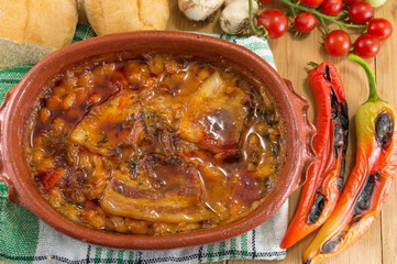Cooked beans in a traditional pottery bowl