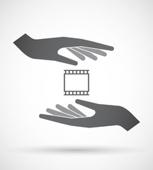 Isolated pair of hands protecting or giving   a photographic 35m