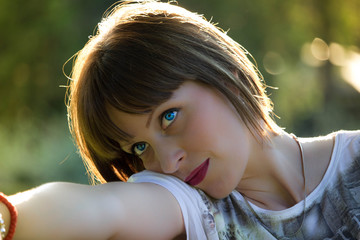 beautiful blue-eyed girl in the park