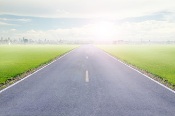 Highways road with blue skies and city background.