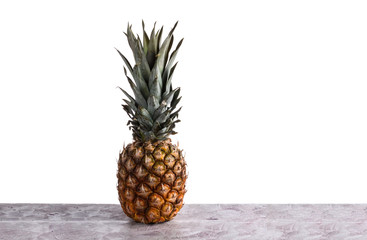 Perfect Pineapple is on the table and on a white background in t