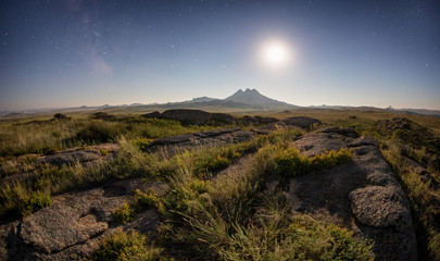 Moon rise on desert mountains names Aiyrtau, Eastern Kazakhstan, Central Asia. - 122753133