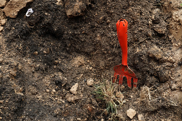 red mattock on soil
