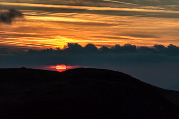 Amazing evening sky in golden sunset colors