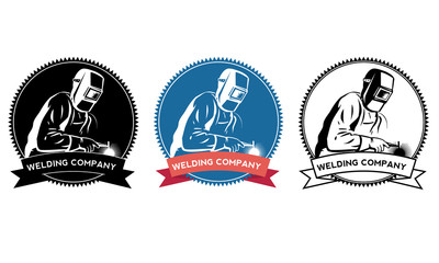 Silhouette of a working welding with a torch. Welding logo Vector